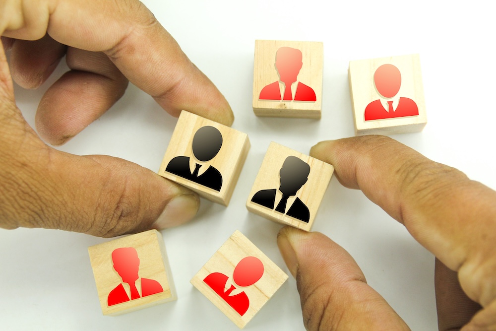 Employees icon on wooden cubes with single red col 2023 11 27 04 59 08 utc